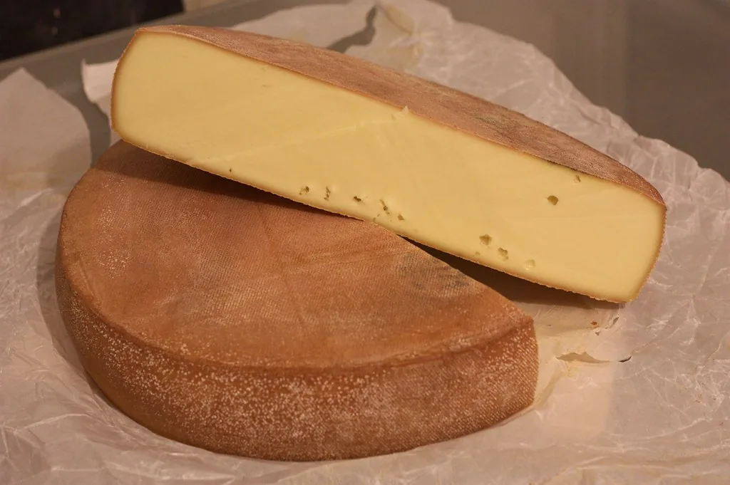 Histoire du fromage à raclette, fromage fondu raclé à l'ancienne