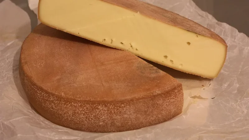 Histoire du fromage à raclette, fromage fondu raclé à l'ancienne